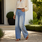 Vivienne blue side-button wide-leg jeans styled with a cream blouse